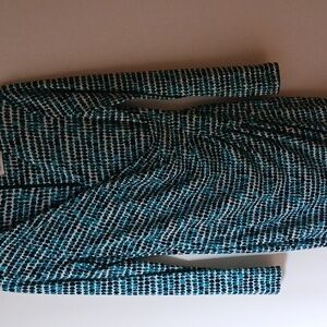 Elegant turquoise, black, and white patterned dress